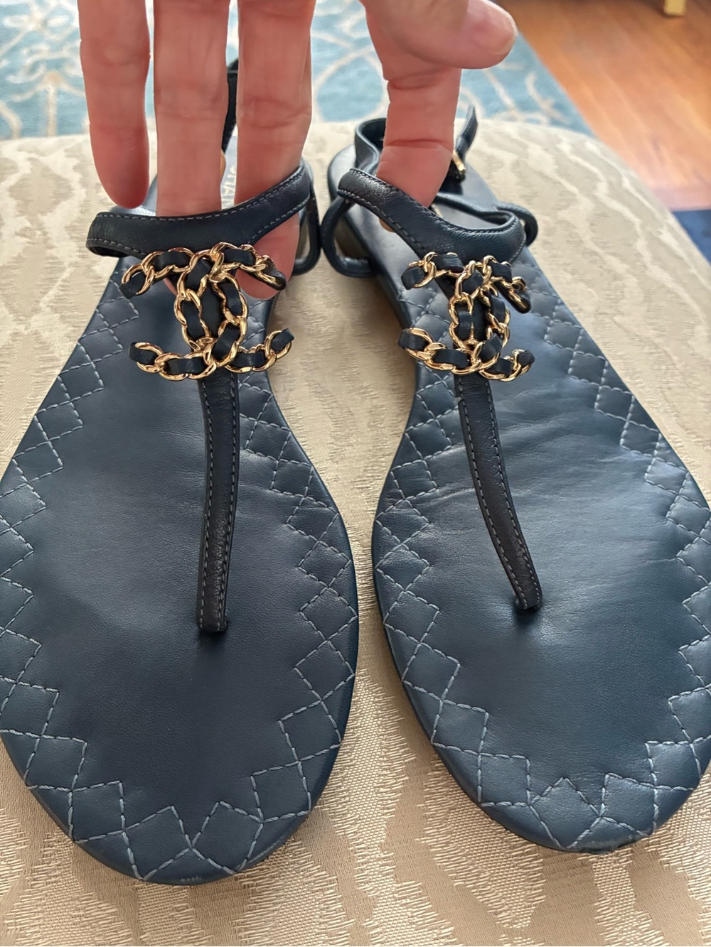 Black Quilted Chanel Thong Sandals with Gold CC and sole protector.